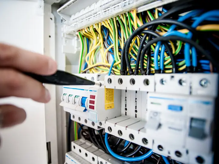 Electrician working on a distribution board